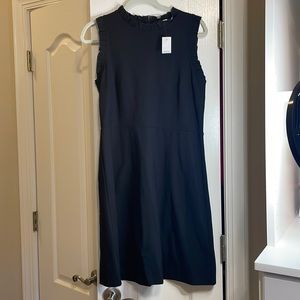 Loft black ponte dress with ruffle trim